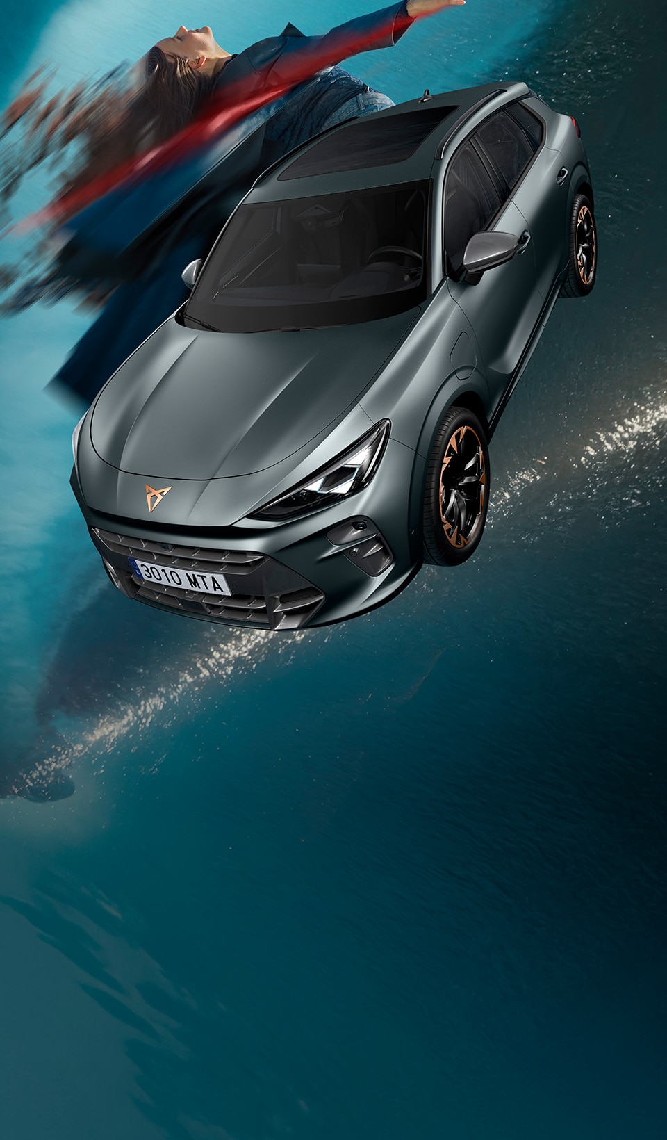 A CUPRA Terramar SUV shown from a high angle, appearing to be in motion with a red light streak extending from its side to a person lying horizontally in the air next to it. A CUPRA Terramar SUV shown from a high angle, appearing to be in motion with a red light streak extending from its side to a person lying horizontally in the air next to it.