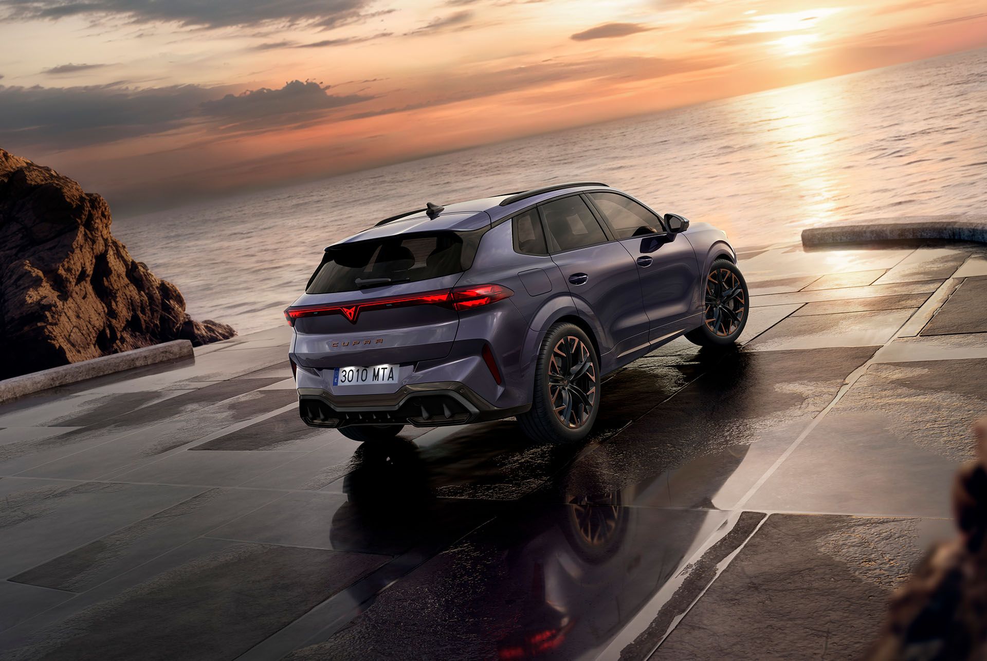 rear view of 2024 cupra terramar with hybrid engine, hd headlights, dcc sport, 20" hadron copper wheels, high canyon interior and cupra logo 3d rear lights, at sunset.